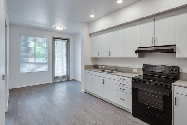 Modern kitchen area in a senior living apartment