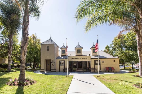 Exterior view of Canterbury Court Senior Apartments with landscaping