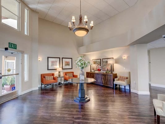 Bright and inviting lobby with seating and decorative elements