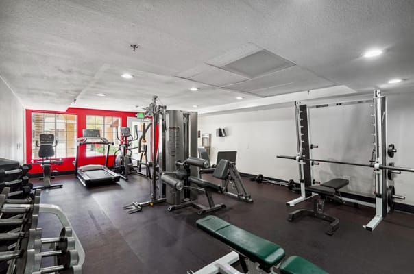 Interior view of a fitness area with exercise equipment