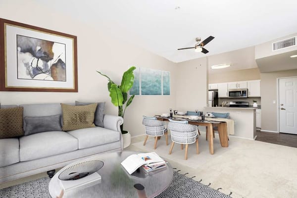 A well-furnished living room area with dining space