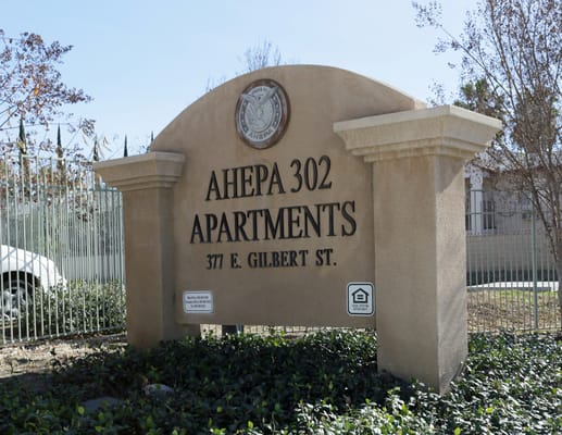 Sign for Ahepa 302 Apartments outside the facility