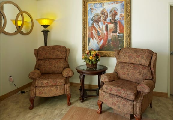 Cozy seating area with artwork in a common space