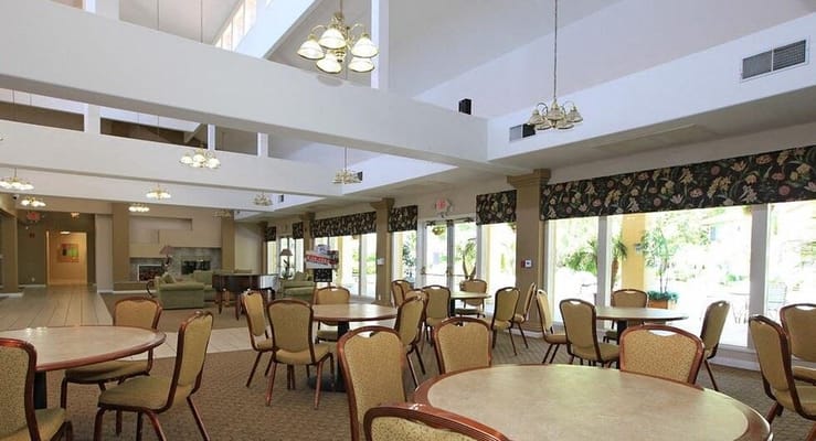 Bright common area with tables and chairs