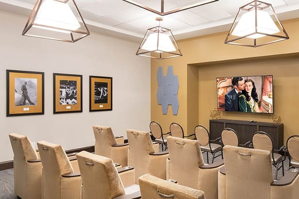 Comfortable seating in a lounge with movie screening area