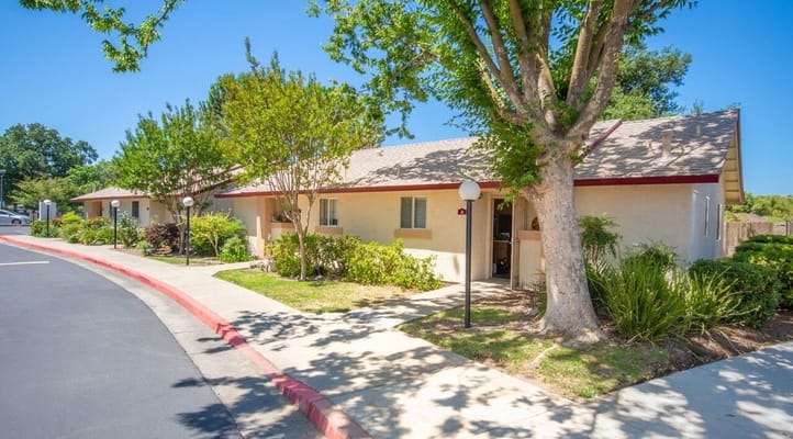Exterior view of Sherwood Manor Senior Apartments with landscaping