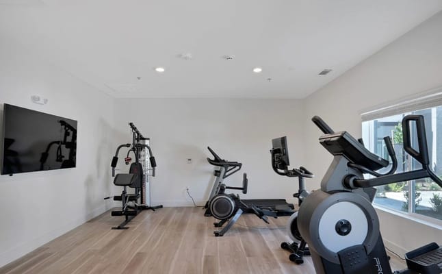 Fitness room with exercise equipment