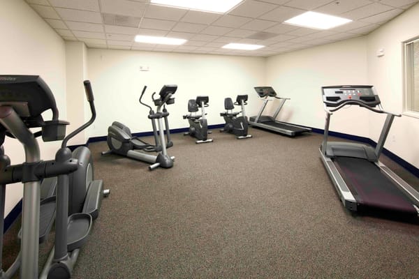Interior view of a fitness room with exercise equipment