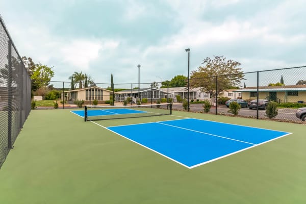 Outdoor tennis courts at a senior living community