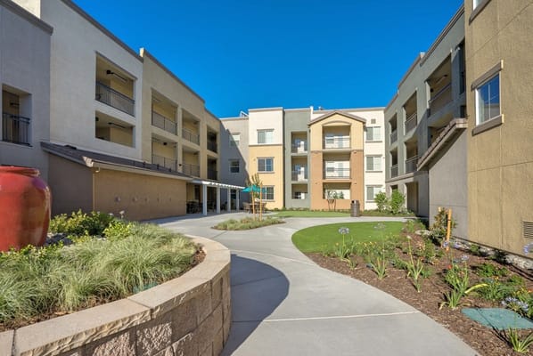 Outdoor courtyard area of Arbor Creek Senior Apartments