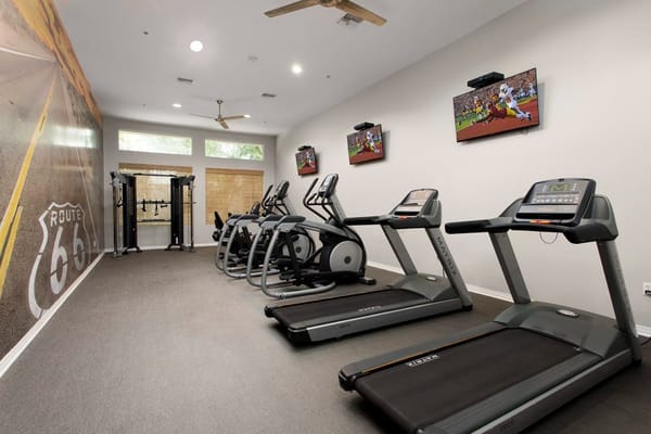 Interior view of a fitness room with exercise equipment