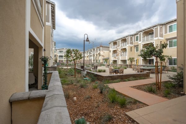 Outdoor seating area surrounded by buildings