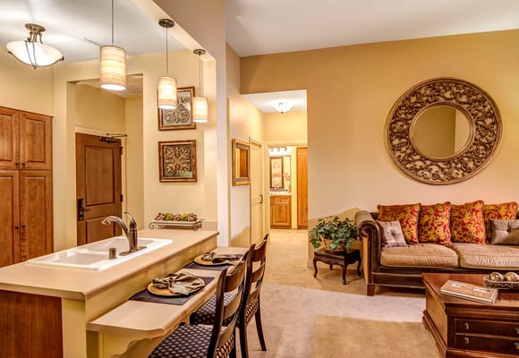 A cozy living space in a senior facility with decorative elements