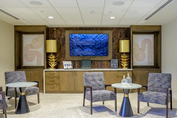 Modern lounge area with decorative elements and seating