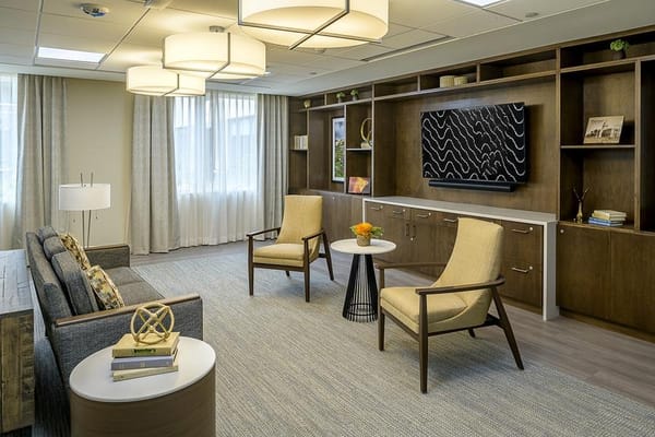 Cozy common area with seating and television