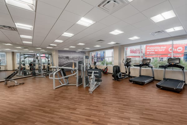 Well-equipped fitness room with gym equipment