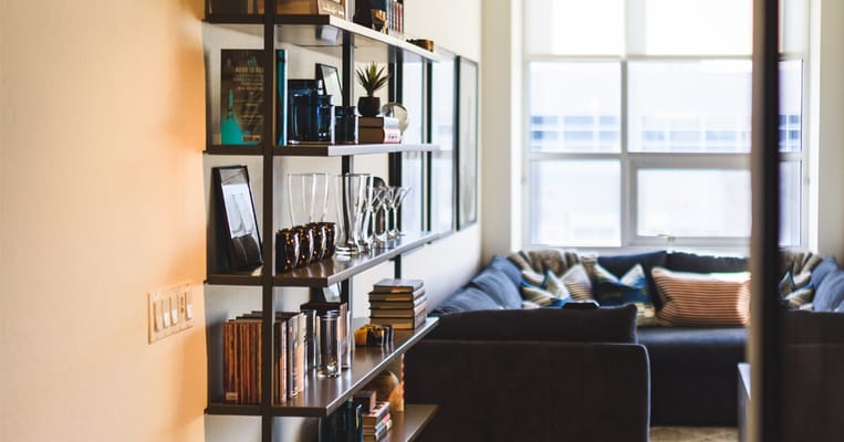 Cozy common area with bookshelves and seating