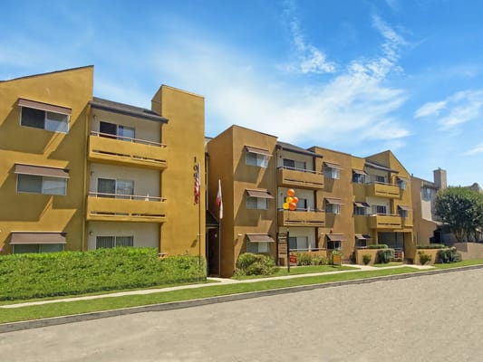 Exterior view of Monarch Terrace Apartment Homes with vibrant colors