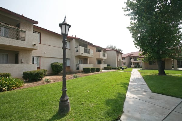 Outdoor view of apartment building with gardens