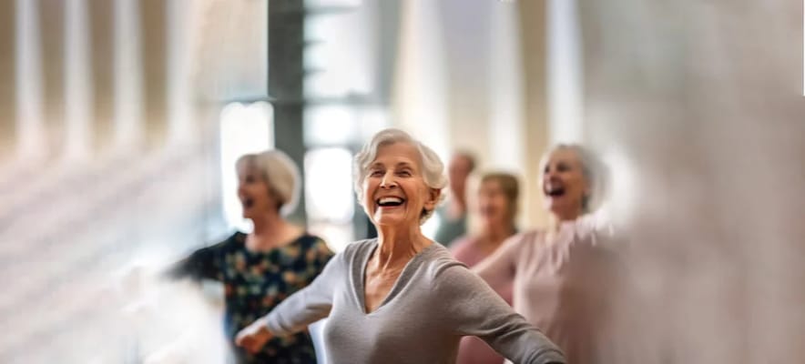 Residents participating in a joyful activity indoors