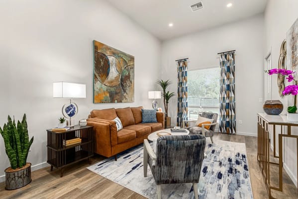 Bright and spacious common area with seating and decor