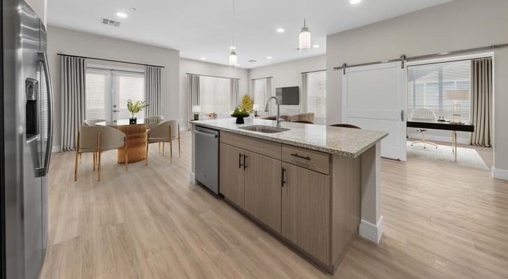 Bright and modern common area kitchen with seating