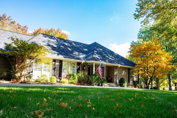 A front view of SeniorCare Homes showing the exterior and garden