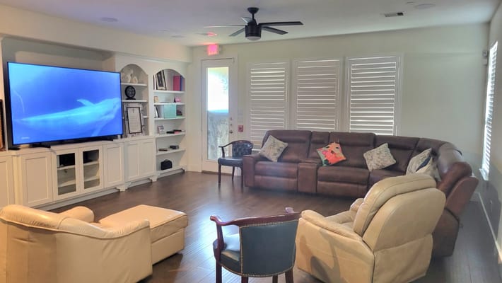 Cozy common area with seating and a TV