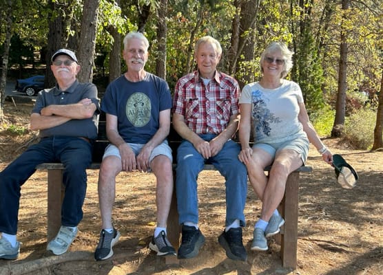 Residents enjoying time outdoors on a bench