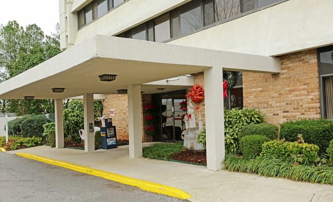 Exterior view of the facility entrance decorated for the holidays