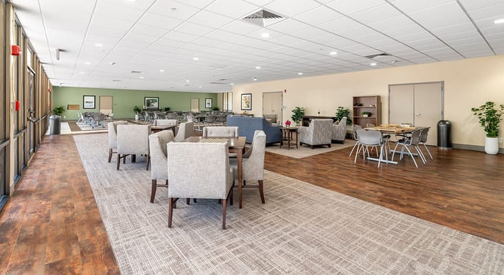 Spacious common area with seating and dining options