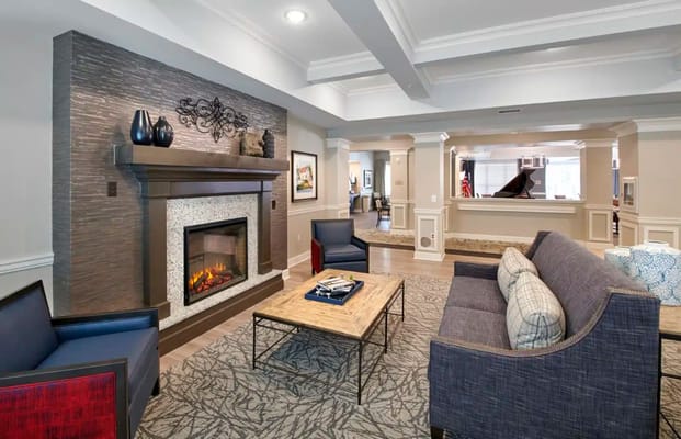 Cozy common area with a fireplace and seating