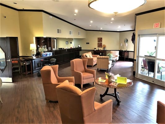 Spacious lobby area with comfortable seating at City Center Village