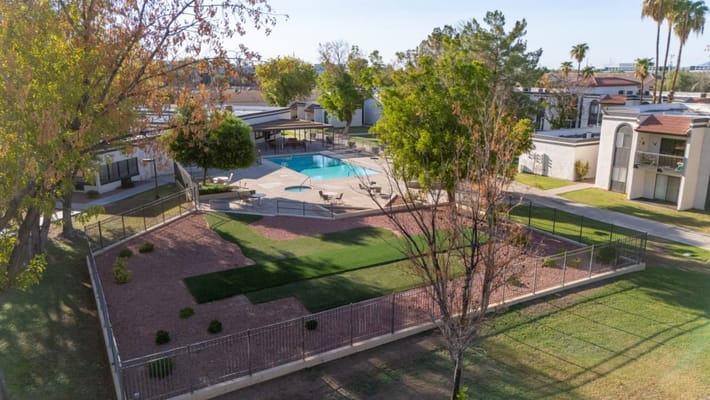 Aerial view of a pool area and outdoor space