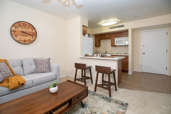Cozy interior view of a resident unit with kitchen and living area