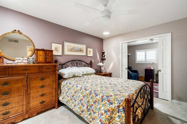 A well-decorated bedroom in a senior living facility
