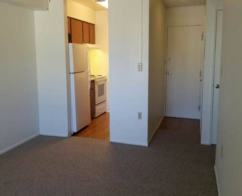 Interior view of a resident room with kitchen