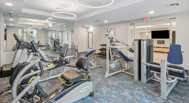 Fitness center with exercise equipment and seating