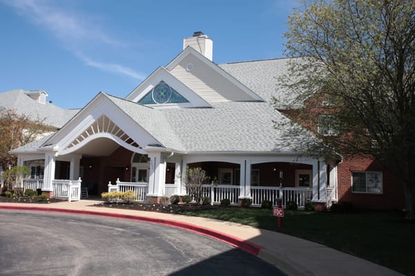 Exterior view of a nursing home facility with porch
