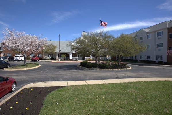 Exterior view of the facility with landscaping