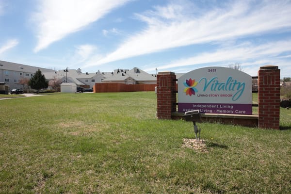Exterior view of Vitality Living Stony Brook sign and building