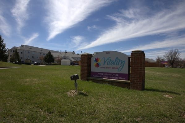 Exterior view of Vitality Living Stony Brook sign and building