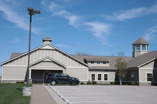 Exterior view of the facility with parking lot