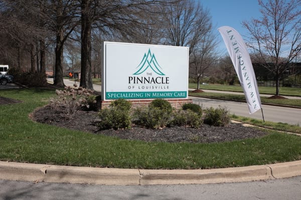 Sign of The Pinnacle of Louisville featuring memory care specialization.