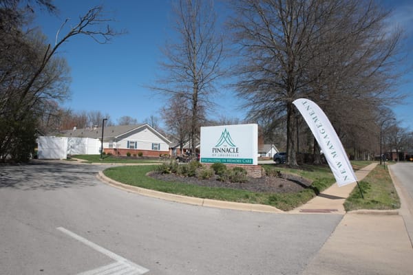 Entrance sign of The Pinnacle of Louisville senior living facility
