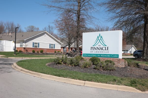 Entrance sign at The Pinnacle of Louisville senior living facility