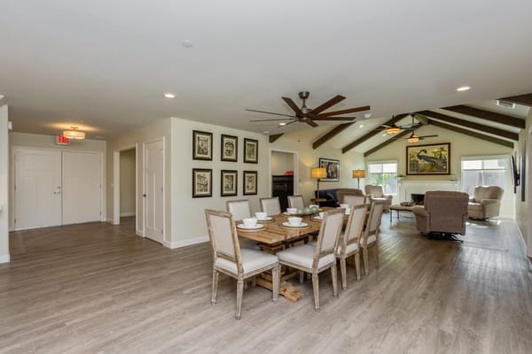Bright dining area with wooden furniture and decor