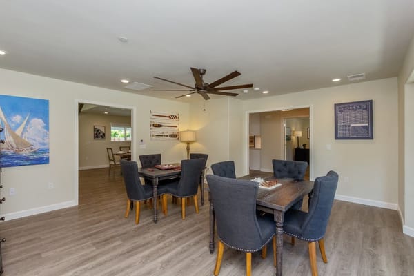 Indoor seating area with tables and chairs