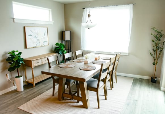 Bright dining room with a large wooden table