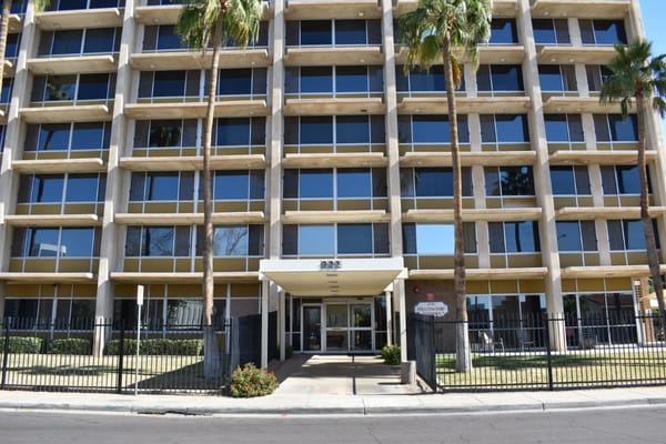 Entrance of Fellowship Towers with palm trees